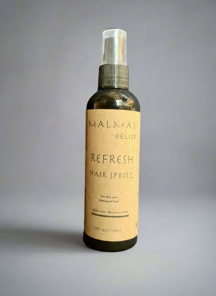 Hair spritz bottle labeled 'Refresh' by MALMAI on a gray background